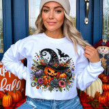 Pumpkin Witch DTF Heat Transfer, a colorful Halloween-themed design featuring a smiling pumpkin with a witch hat, surrounded by flowers, bats, and decorative elements.