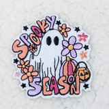 Spooky Season Embroidered HAT/POCKET Patch featuring a cute ghost holding a pumpkin bag and surrounded by colorful flowers and stars.