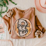Bonus Mom Fall Brushstrokes DTF Heat Transfer, Etsy design on a peach-colored sweatshirt with fall-themed elements around it.