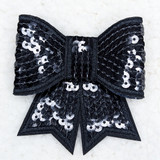 Black Sequin Bow HAT/POCKET Patch, decorative black bow with shiny sequins and stitched edging.
