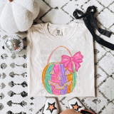 Pastel Faux Glitter Pumpkin with Bow DTF Heat Transfer, colorful pumpkin design with glitter accents and pink bow on a white t-shirt.
