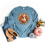 Faux Sequins Turkey DTF Heat Transfer, blue long sleeve shirt with a colorful, glittering turkey design for fall or Thanksgiving celebrations.