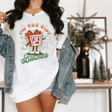 I'm The Gift Bitches DTF Heat Transfer, a graphic T-shirt featuring a cartoon gift box character with a bow, smiling and pointing, with the phrase 'I'm The Gift Bitches' in bold, colorful text.