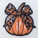 Leopard BOW Pumpkin Embroidered HAT/POCKET Patch, embroidered patch featuring a leopard bow on a pumpkin.