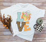 Love fall pumpkin Word Art Sublimation Transfer, decorative fall-themed shirt with colorful pumpkin and floral design.