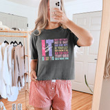 It Is Okay To DTF Heat Transfer, woman wearing a graphic T-shirt with motivational phrases, in a bedroom setting.