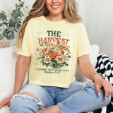 The Harvest Is Plentiful DTF Heat Transfer, floral design with text and Bible verse on a women's yellow T-shirt.