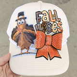 Turkey Sequin Hat/POCKET Patch, beige cap with colorful embroidered patch featuring a turkey wearing a hat and a 'Fall Vibes' message with a bow tie design
