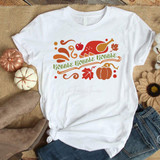 Gobble Gobble Gobble Sublimation Transfer, printed on a white T-shirt with autumn-themed graphics including a turkey leg, pumpkin, leaves, and swirls.