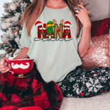 Nana Claus Faux Embroidery DTF Heat Transfer Christmas sweatshirt with festive design of Santa, elf, and reindeer, on holiday-themed apparel.