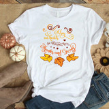 May our hearts be filled with thanks and giving Sublimation Transfer, white T-shirt with orange, yellow, and brown fall-themed text and leaf graphics.