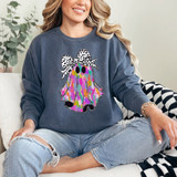Brushstroke Ghost Dot Bow DTF Heat Transfer, colorful ghost design with a black and white polka dot bow on a woman wearing a sweatshirt.