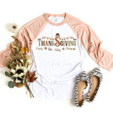 Thanksgiving word art dangle sublimation transfer, product image of a Thanksgiving-themed shirt with text and icons, accompanied by flowers and striped shoes.