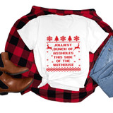 Jolliest Bunch Of Assholes This Side of the Nuthouse DTF Heat Transfer, white t-shirt with red holiday themed text and graphics, surrounded by plaid shirt, jeans, and boots.