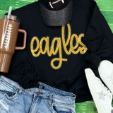 Eagles Gold Sequin Patch, a gold glittery embroidered patch in the shape of the word 'eagles' on a black sweatshirt.