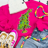 Chenille Colorful Tree Patch, vibrant Christmas tree embroidery on a pink sweatshirt with seasonal accessories.