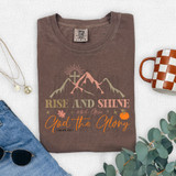 Rise And Shine And Give God The Glory Pumpkin DTF Heat Transfer, printed on a brown T-shirt with mountain, cross, and pumpkin graphics.