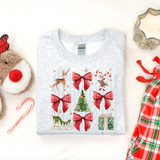 Vintage Christmas DTF Heat Transfer, festive holiday design on a gray T-shirt featuring Christmas elements like a reindeer, bows, a tree, a sleigh, candy canes, and gift boxes.