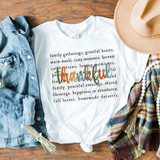 Thankful Fall Colors DTF Heat Transfer, a colorful fall-themed design with the word 'thankful' in mixed colors on a white t-shirt, accompanied by autumn accessories like denim jacket, hat, pearl necklace, and plaid scarf.