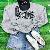 Braves Sequin Patch, shiny and colorful sequin embroidery on the word 'Braves' on a grey sweatshirt.