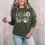 Ho Ho Woof DTF Heat Transfer, colorful dog paw and holiday themed design on a women's sweatshirt.