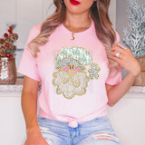 Coquette Green Floral Santa Faux Glitter DTF Heat Transfer, a festive Christmas-themed design featuring a stylized Santa face with floral and glitter accents on a pink T-shirt.