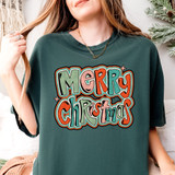 Retro Merry Christmas DTF Heat Transfer, colorful festive Christmas graphic on dark green t-shirt.