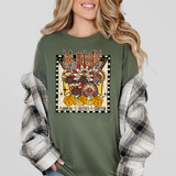 Def Hungry Turkeys DTF Heat Transfer, colorful Thanksgiving-themed design on a green T-shirt featuring animated turkeys, pumpkins, and text with words like thankful, blessed, and grateful.
