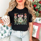Green Nutcrackers DTF Heat Transfer, festive Christmas-themed sweatshirt with nutcracker soldiers and Christmas tree design.