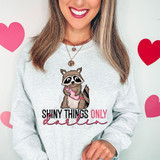 Shiny Things Only Darlin DTF Heat Transfer, illustrated raccoon with pink bandana on sweatshirt