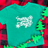 White Puff Merry & Bright Pocket/Infant Screen Print Heat Transfer, green infant T-shirt with 'merry and bright' holiday design, surrounded by Christmas tree and bead decorations.