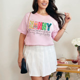 Nanny She Is Clothed In Gratitude Counting Blessings Every Day DTF Heat Transfer, a woman wearing a pink T-shirt with colorful and decorative text design.