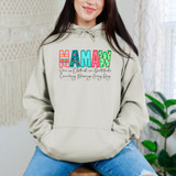 Mamaw She Is Clothed In Gratitude Counting Blessings Every Day DTF Heat Transfer, a woman wearing a white hoodie with colorful and decorative text design on the front.