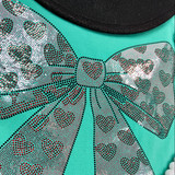 Pink Bow with Hearts Spangle Heat Transfer, detailed close-up of a decorative heat transfer applied to a teal fabric with rhinestone embellishments.