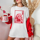 Dolly Queen DTF Heat Transfer, white T-shirt with red graphic design of a woman's portrait and heart, worn by a woman holding a heart-patterned mug.