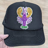 Mardi Gras Crawfish Sequin HAT/POCKET Patch, a black trucker cap with a colorful, glittering crawfish patch embroidered on the front.