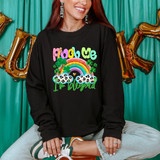Pinch Me I'm Blessed DTF Heat Transfer, colorful design with rainbow, shamrocks, and clouds on a black sweatshirt for St. Patrick's Day celebration.