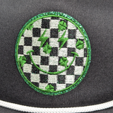 Checkered Happy Face Shamrock Embroidered HAT/POCKET Patch, embroidered patch featuring a checkered pattern with shamrocks, happy face, and lightning bolts design, decorated with green glittered border.