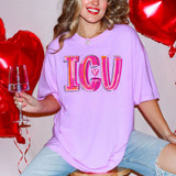 Painted ICU DTF Heat Transfer on a lilac T-shirt, featuring large pink and orange lettering with a heart in the center and artistic black accents.