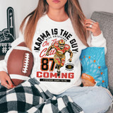 Karma Is The Guy DTF Heat Transfer, a football-themed T-shirt design featuring a cartoon football player in action with bold text and vibrant colors.