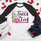 Succa For Love Sublimation Transfer, colorful cute cactus and pumpkin design on a white and black long sleeve shirt with pink and red hearts.