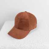 Brown Corduroy Hat, stylish casual cap made of soft textured corduroy fabric with a curved brim.