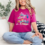 On Earth As It Is In Heaven DTF Heat Transfer, pink T-shirt with colorful landscape and scripture design.