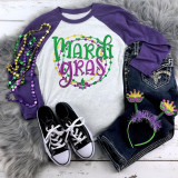 Mardi Gras Sublimation Transfer, vibrant Mardi Gras themed design on a t-shirt for festive celebrations.