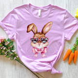 Bubble Bunny Heart Eyes DTF Heat Transfer, pink T-shirt with a cute bunny wearing heart-shaped sunglasses and a pink bow.
