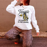 Texas Is For Lovers DTF Heat Transfer, graphic design of a cowgirl riding a horse with a sunset background.