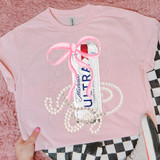 MicUltra Coquette Bow DTF Heat Transfer, pink and white soda can with pink bow on a pink t-shirt, surrounded by pearl necklaces.