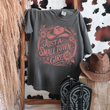 Just A Small Town Girl Hat MAUVE DTF Heat Transfer, mauve-colored heat transfer design on a dark gray t-shirt featuring a cowboy hat and floral decorations.