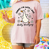 Sorry I'm Late I Was Dilly Dallying DTF Heat Transfer, pink T-shirt with a cute cartoon duck and floral design.