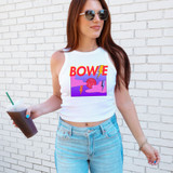 Bow!e DTF Heat Transfer, colorful graphic design of the word 'BOWE' with lightning bolts, brain, and vibrant background on a white sleeveless crop top worn by a woman holding iced coffee.